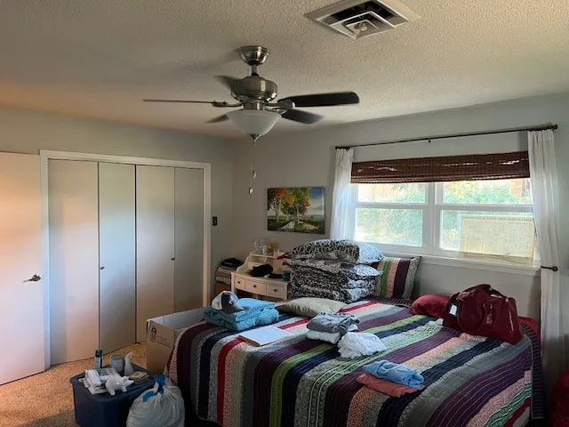 a bathroom with a sink toilet and mirror