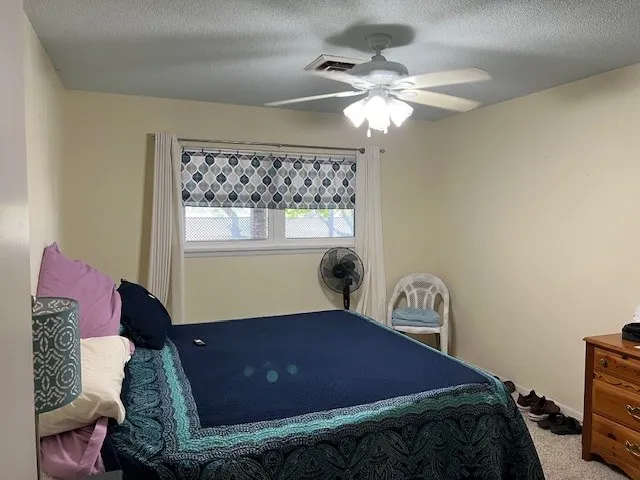 a bathroom with a sink toilet and mirror