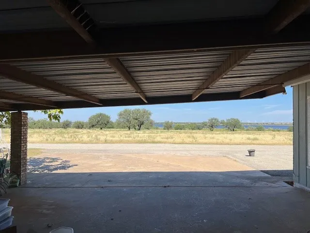a front view of a house with outdoor seating