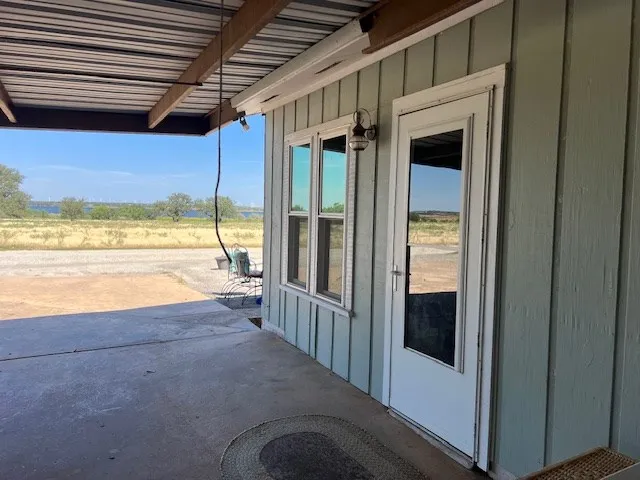 a view of backyard with green space