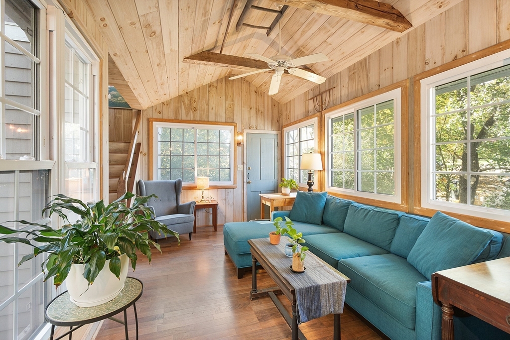 17 Maple Street Sterling, MA 01564 - Photo 11 of 42 a living room with furniture and a large window