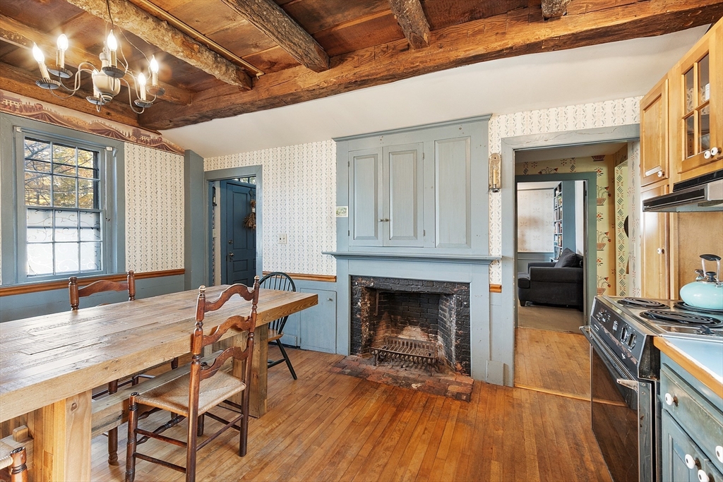 17 Maple Street Sterling, MA 01564 - Photo 15 of 42 a view of a livingroom with furniture and a fireplace