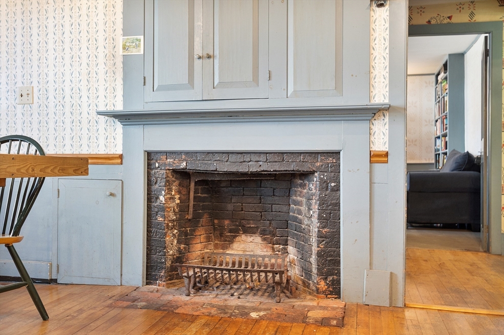 17 Maple Street Sterling, MA 01564 - Photo 18 of 42 a living room with furniture and a fireplace