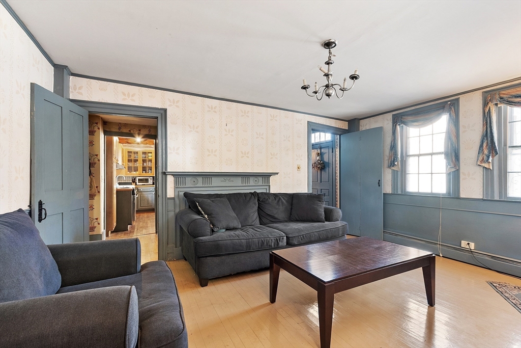 17 Maple Street Sterling, MA 01564 - Photo 20 of 42 a living room with furniture and window