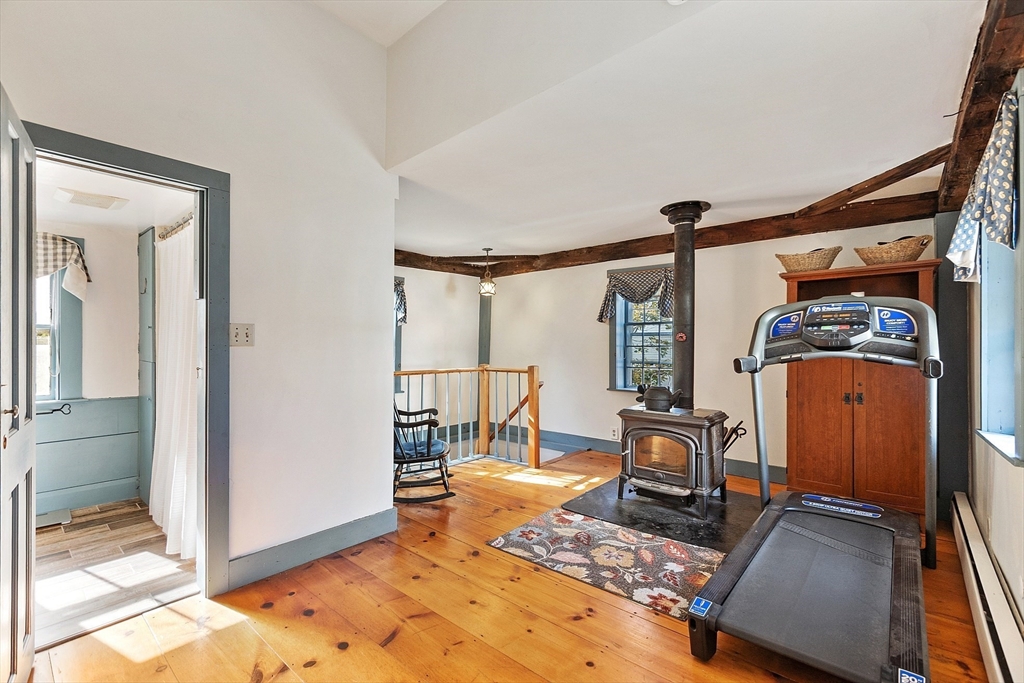 17 Maple Street Sterling, MA 01564 - Photo 22 of 42 a view of a room with gym equipment