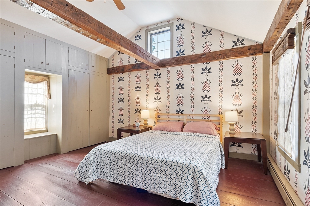 17 Maple Street Sterling, MA 01564 - Photo 29 of 42 a bedroom with a large bed and a window