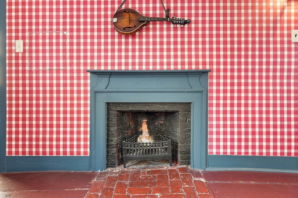 17 Maple Street Sterling, MA 01564 - Photo 34 of 42 a front view of a building with a fireplace