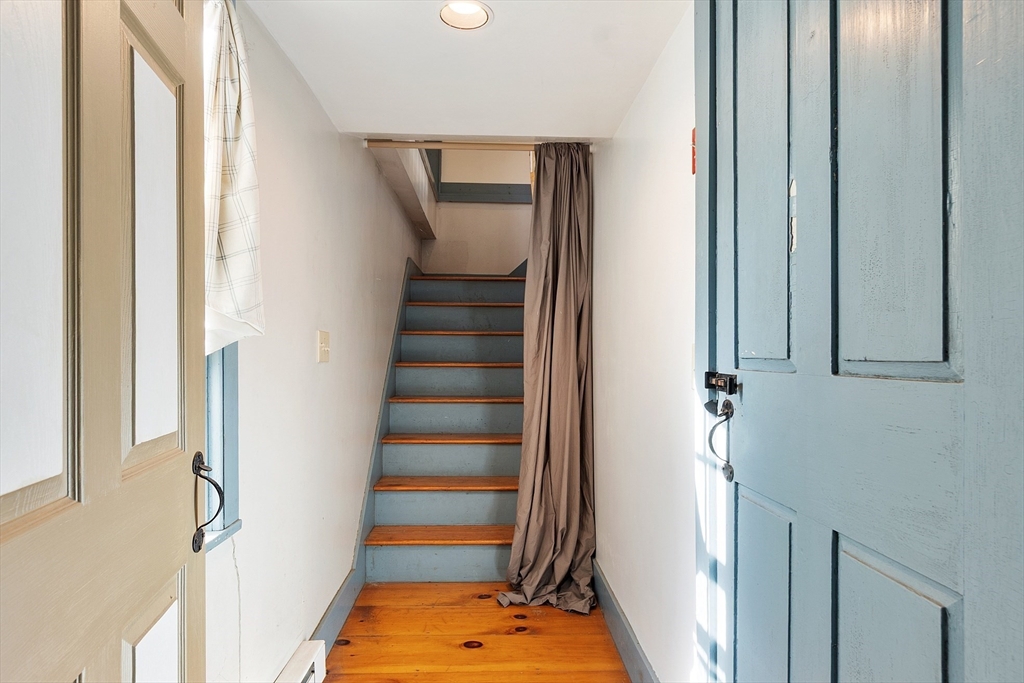 17 Maple Street Sterling, MA 01564 - Photo 39 of 42 a view of staircase with railing and white walls