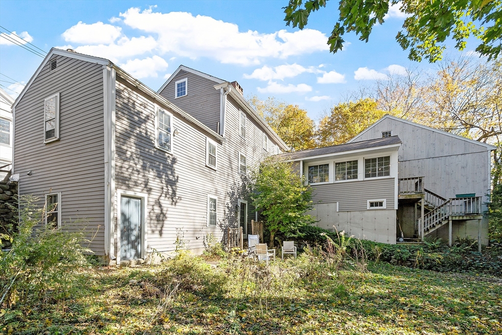 17 Maple Street Sterling, MA 01564 - Photo 42 of 42 a front view of a house with a yard