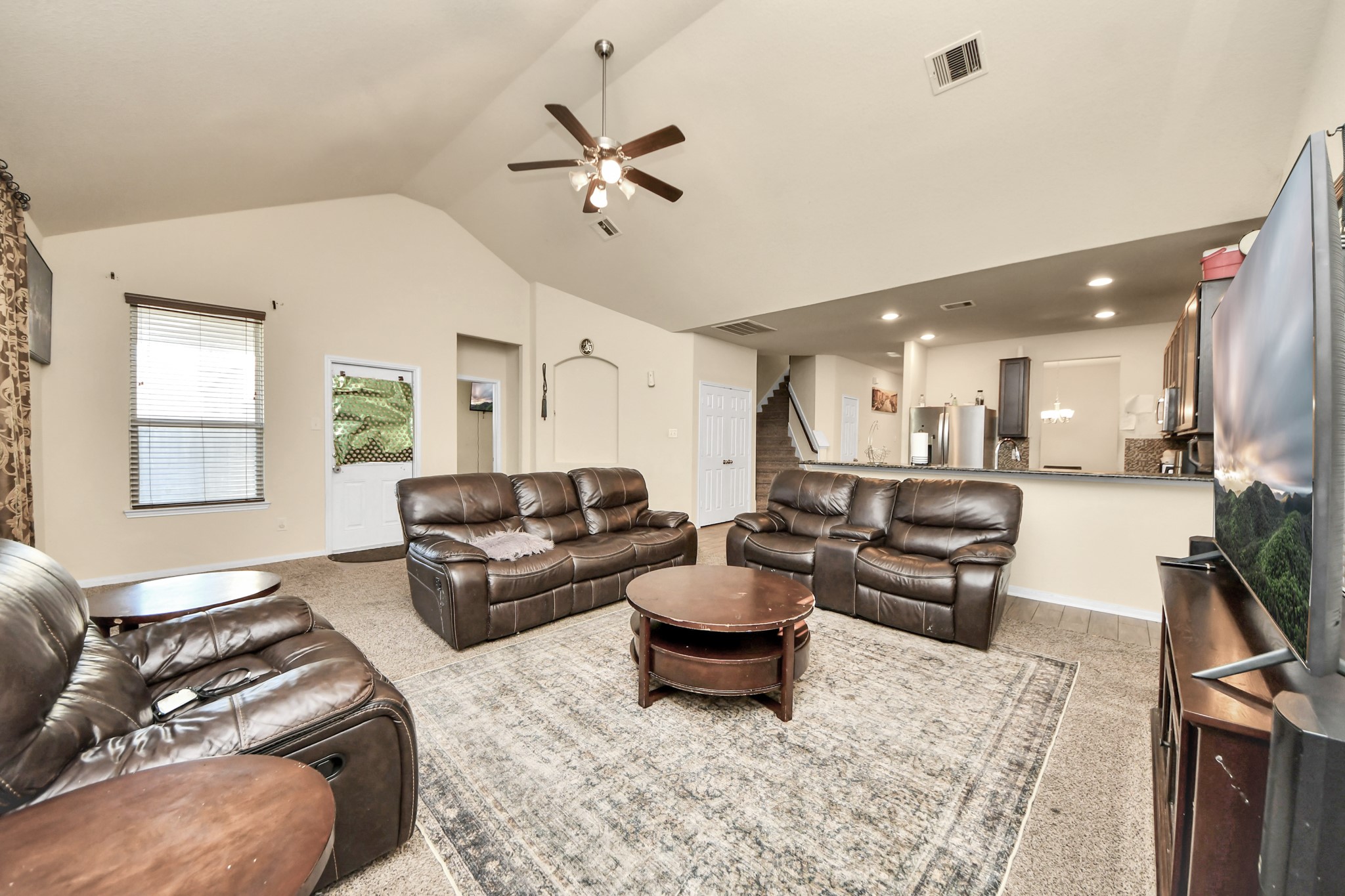 8227 Pastel Dawn Trace Houston, TX 77049 - Photo 5 of 29 a living room with furniture and a large window