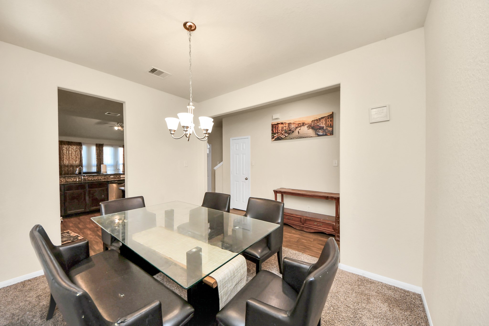 8227 Pastel Dawn Trace Houston, TX 77049 - Photo 7 of 29 a view of a dining room with furniture
