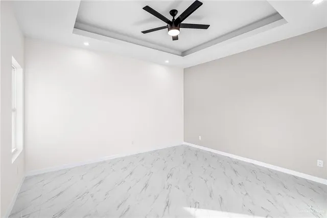 a view of a big room with wooden floor