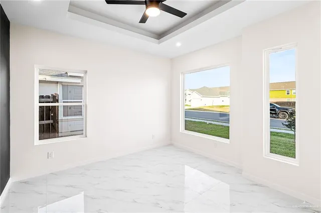 an empty room with windows