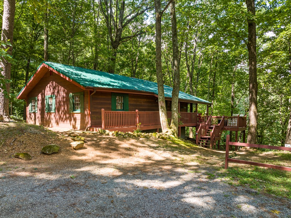 131 Hickory Trace Ellijay, GA 30536 - Photo 2 of 67 a view of a house with backyard