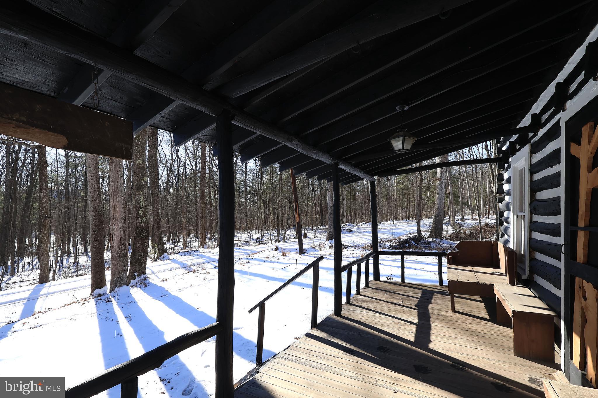 4464 Tram Road Spruce Creek, PA 16683 - Photo 8 of 50 a view of a chairs and tables in the patio