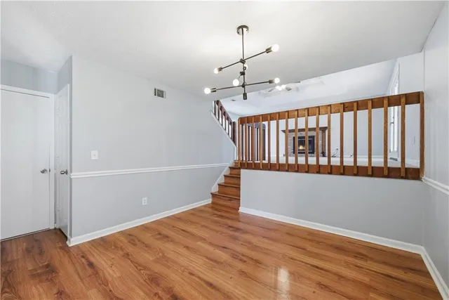 a view of entryway with wooden floor
