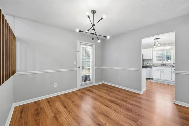 a view of a livingroom with wooden floor