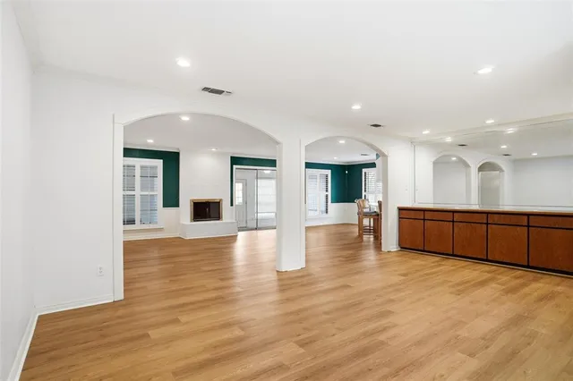 a view of a lobby with black carpet