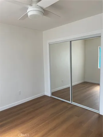 a bathroom with a sink vanity and a mirror