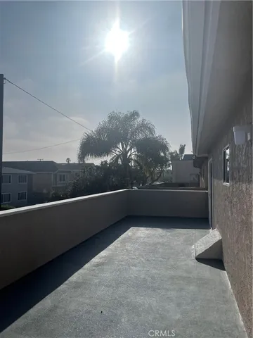 a vase with a vase of flowers sitting on a table