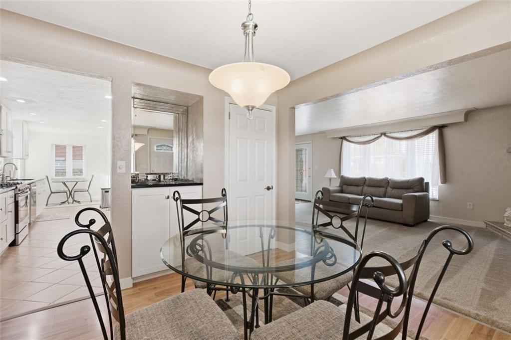120 Crestview Manor Monongahela, PA 15063 - Photo 17 of 39 a view of a dining room with furniture and wooden floor