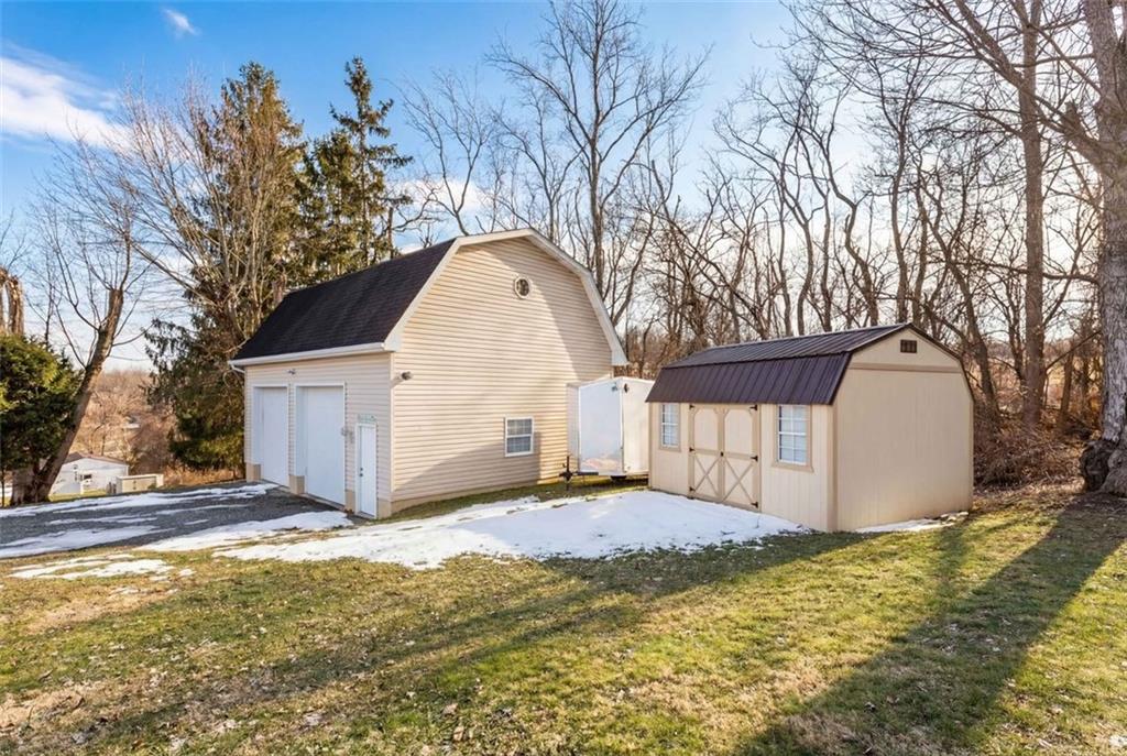120 Crestview Manor Monongahela, PA 15063 - Photo 4 of 39 a view of a house with a yard covered with snow