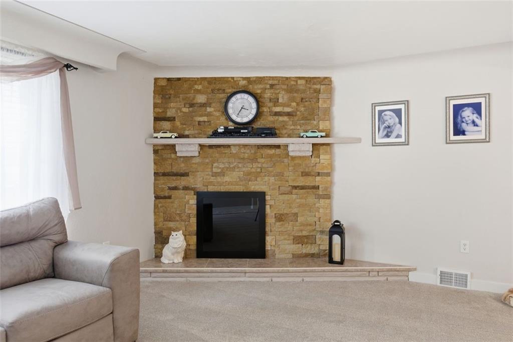 120 Crestview Manor Monongahela, PA 15063 - Photo 9 of 39 a living room with furniture and a fireplace