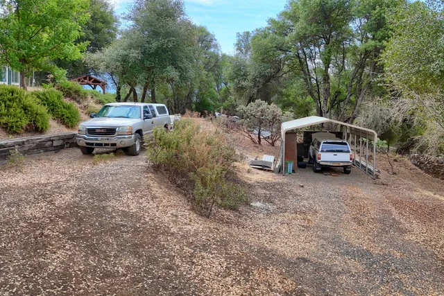 a car parked in the middle of a field