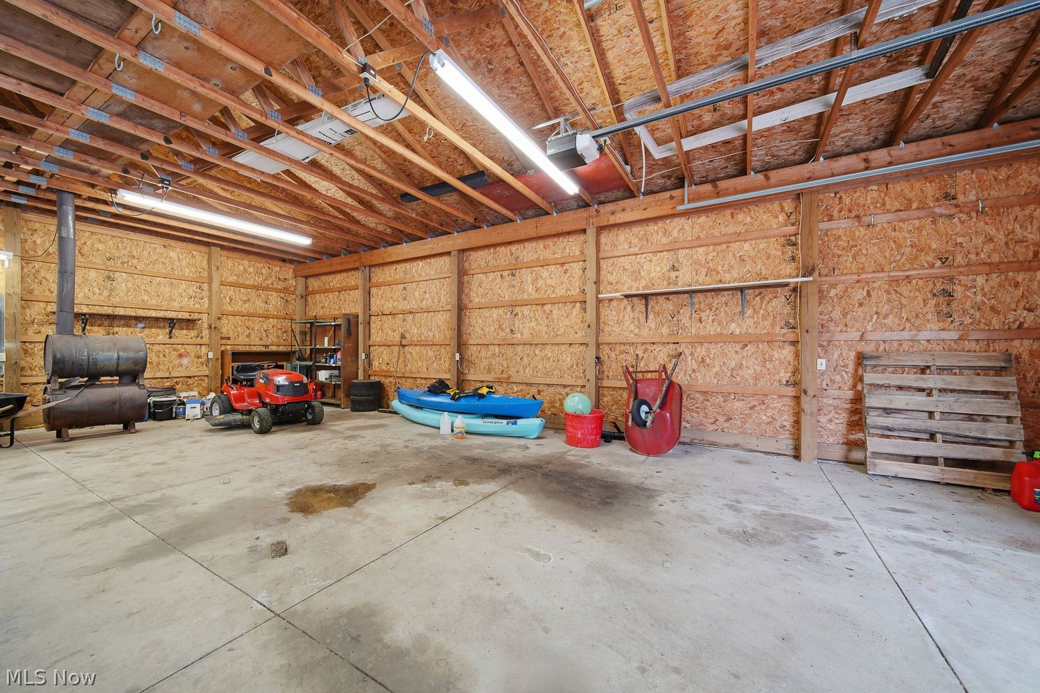 1556 Koons Road North Canton, OH 44720 - Photo 8 of 30 Ideal setup for car enthusiasts, hobbyists, contractors, or anyone needing extra storage flexibility with 220 amp service