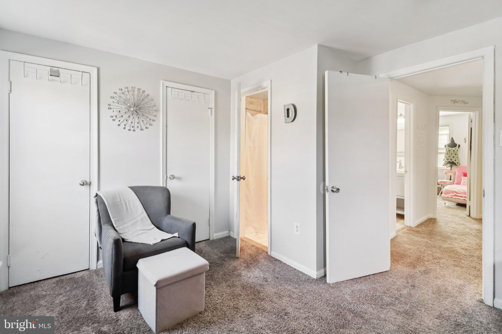 1456 Potomac Heights Drive, Unit 145 Fort Washington, MD 20744 - Photo 23 of 50 a living room with furniture and a chair