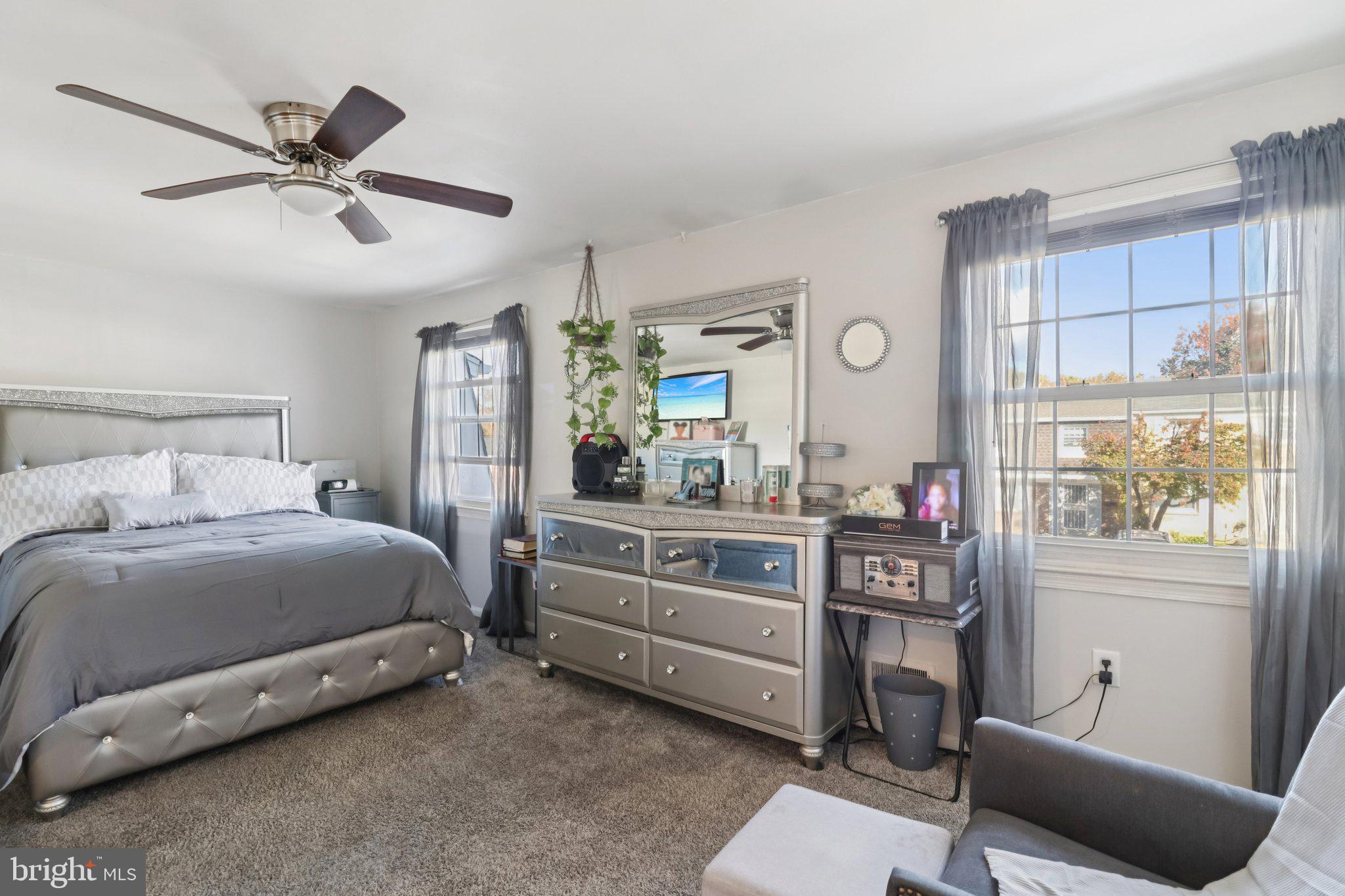 1456 Potomac Heights Drive, Unit 145 Fort Washington, MD 20744 - Photo 26 of 50 a bedroom with a bed and a window