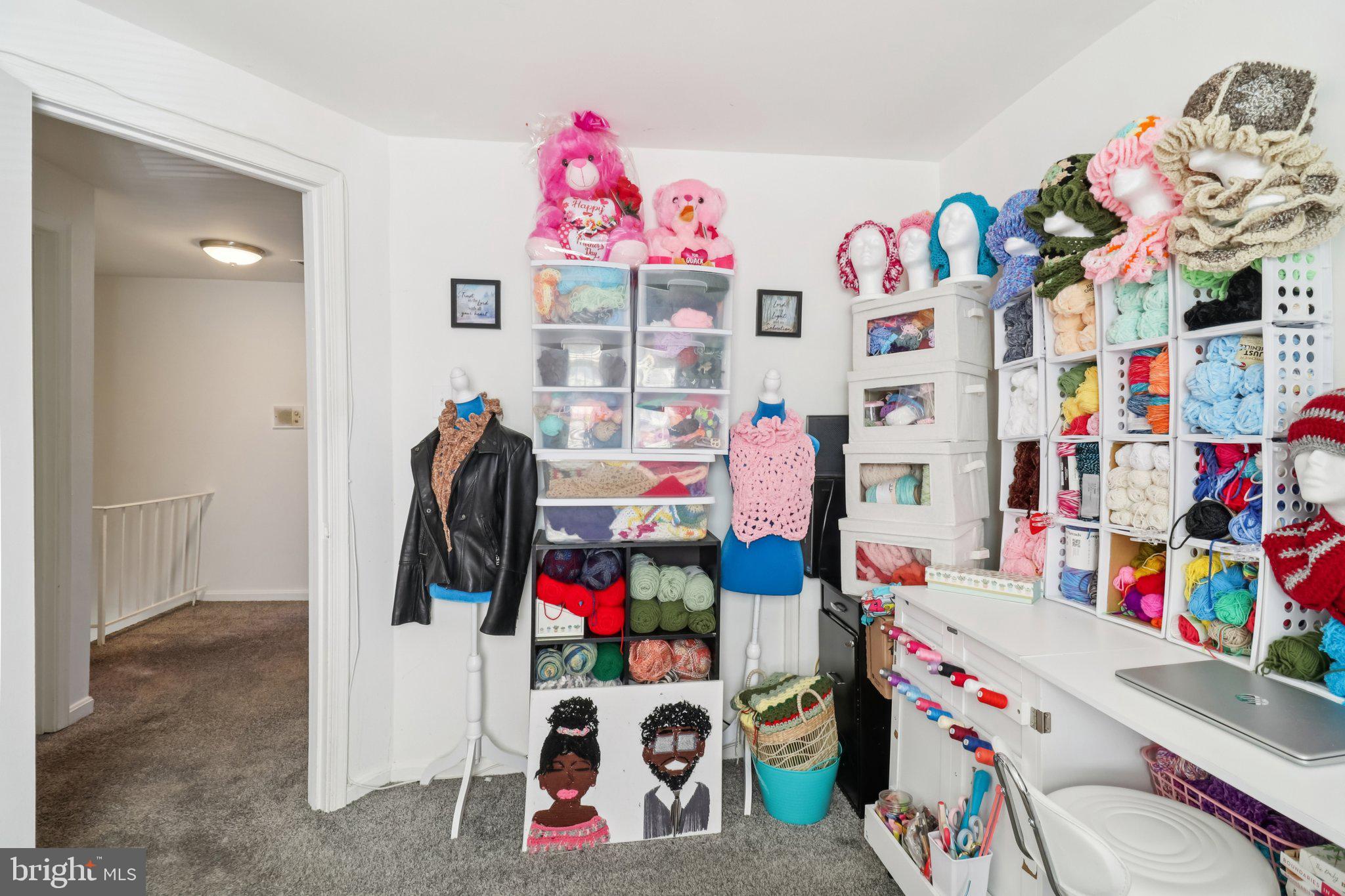 1456 Potomac Heights Drive, Unit 145 Fort Washington, MD 20744 - Photo 32 of 50 a utility room with lots of baby toys