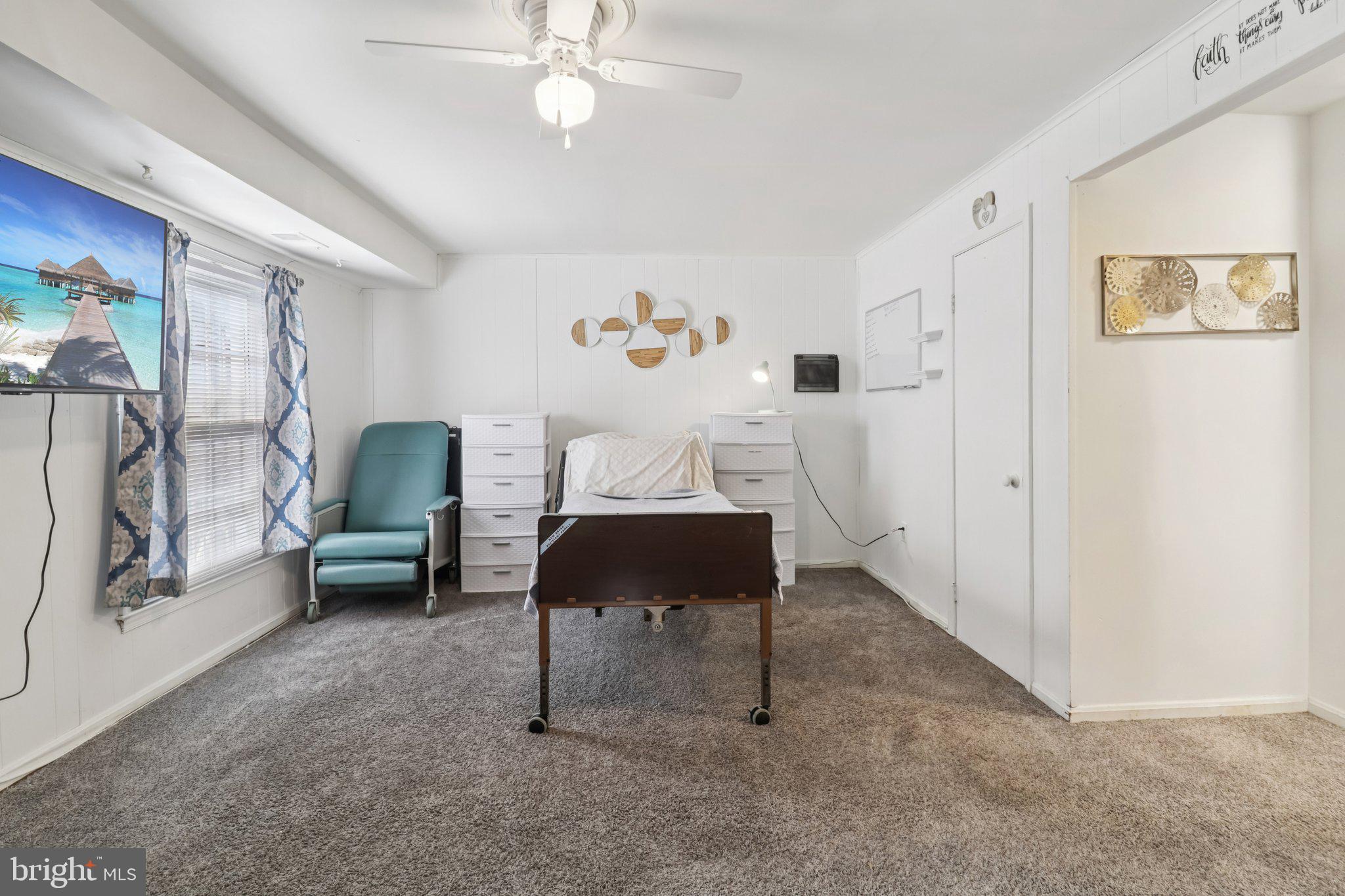 1456 Potomac Heights Drive, Unit 145 Fort Washington, MD 20744 - Photo 43 of 50 a living room with furniture and a rug