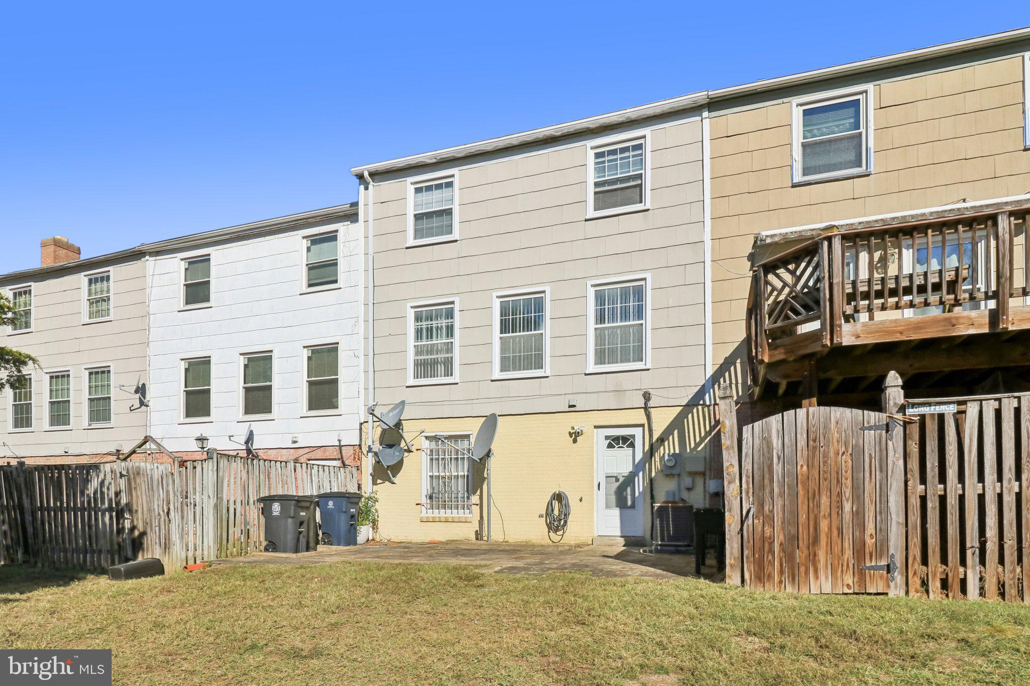 1456 Potomac Heights Drive, Unit 145 Fort Washington, MD 20744 - Photo 45 of 50 a front view of a house with a yard