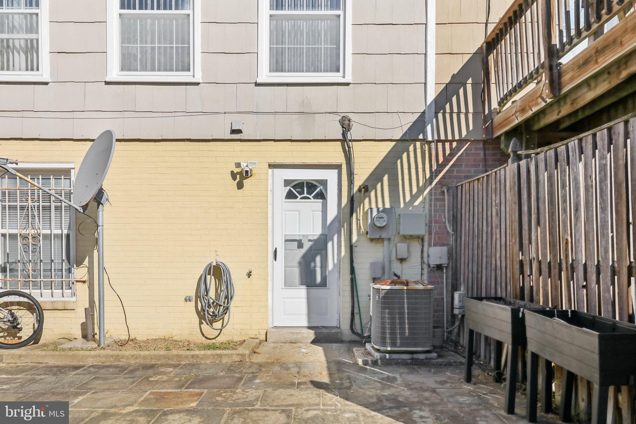 1456 Potomac Heights Drive, Unit 145 Fort Washington, MD 20744 - Photo 46 of 50 a view of front door of house with wooden stairs