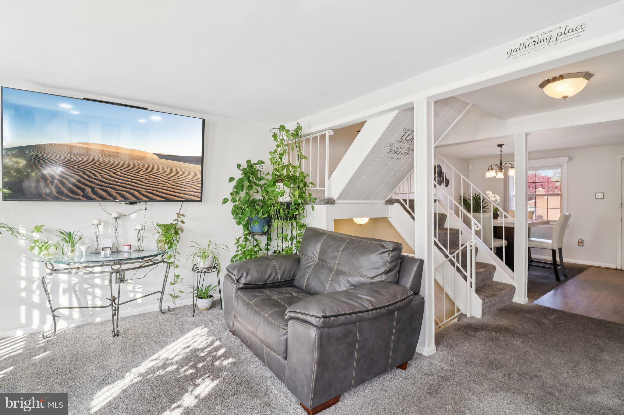 1456 Potomac Heights Drive, Unit 145 Fort Washington, MD 20744 - Photo 9 of 50 a living room with furniture and a flat screen tv