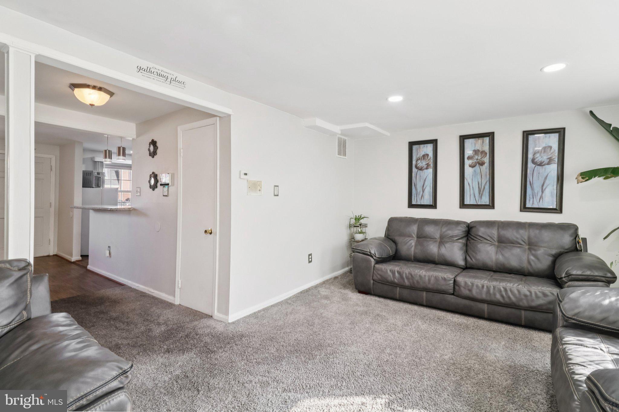 1456 Potomac Heights Drive, Unit 145 Fort Washington, MD 20744 - Photo 10 of 50 a living room with furniture and window