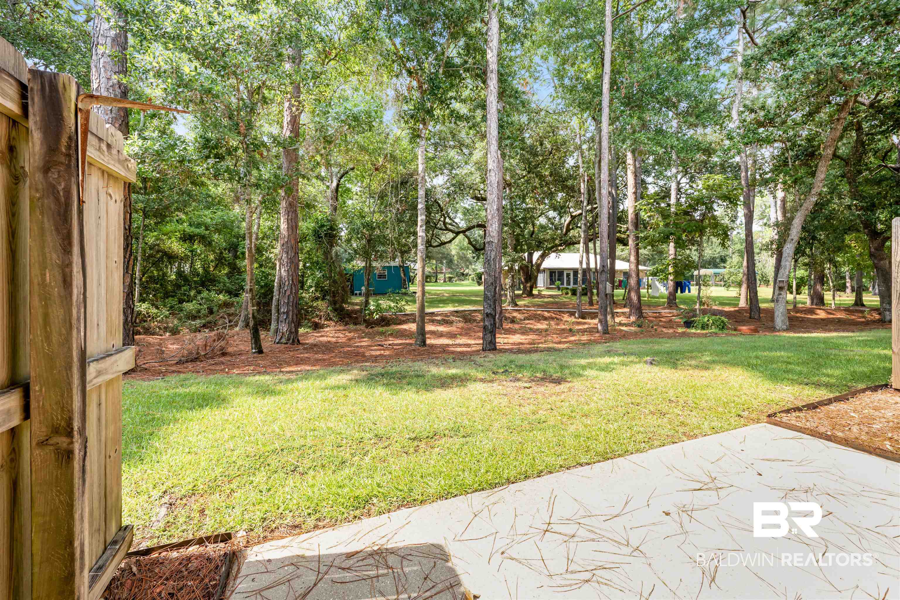 1517 Regency Road, Unit 85 Gulf Shores, AL 36542 - Photo 22 of 32 View of yard