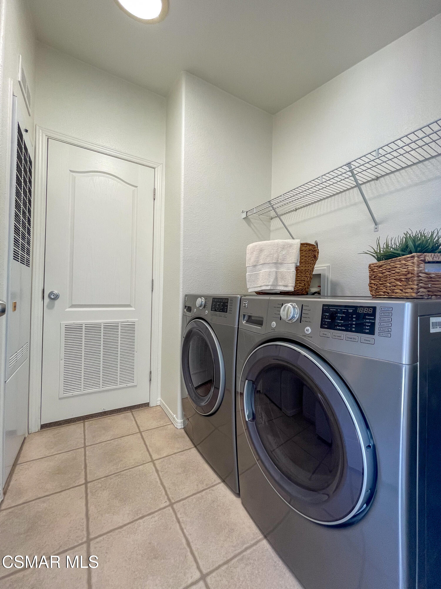 59 Farland Drive Thousand Oaks, CA 91320 - Photo 19 of 24 a view of a storage & utility room with washer and dryer