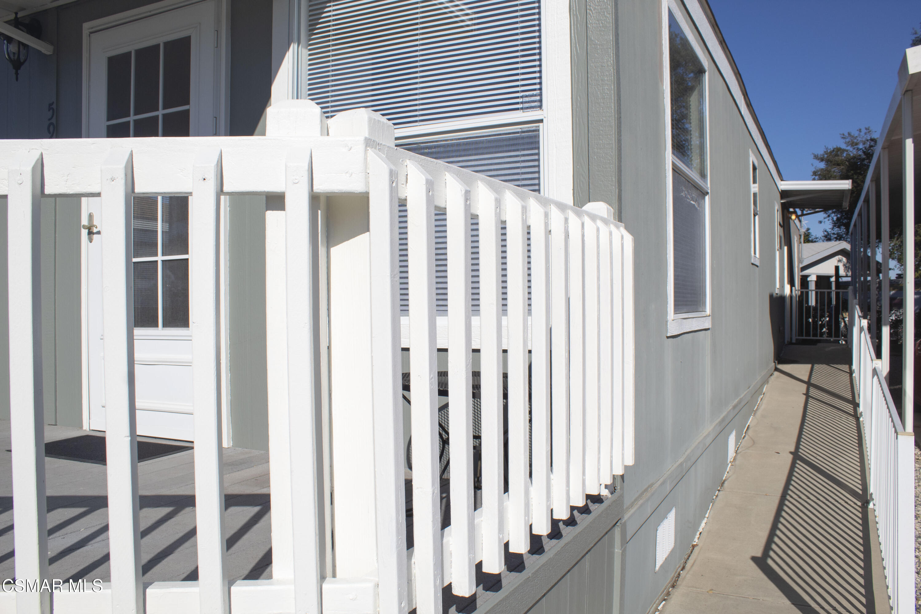 59 Farland Drive Thousand Oaks, CA 91320 - Photo 21 of 24 a view of a balcony with wooden floor and fence