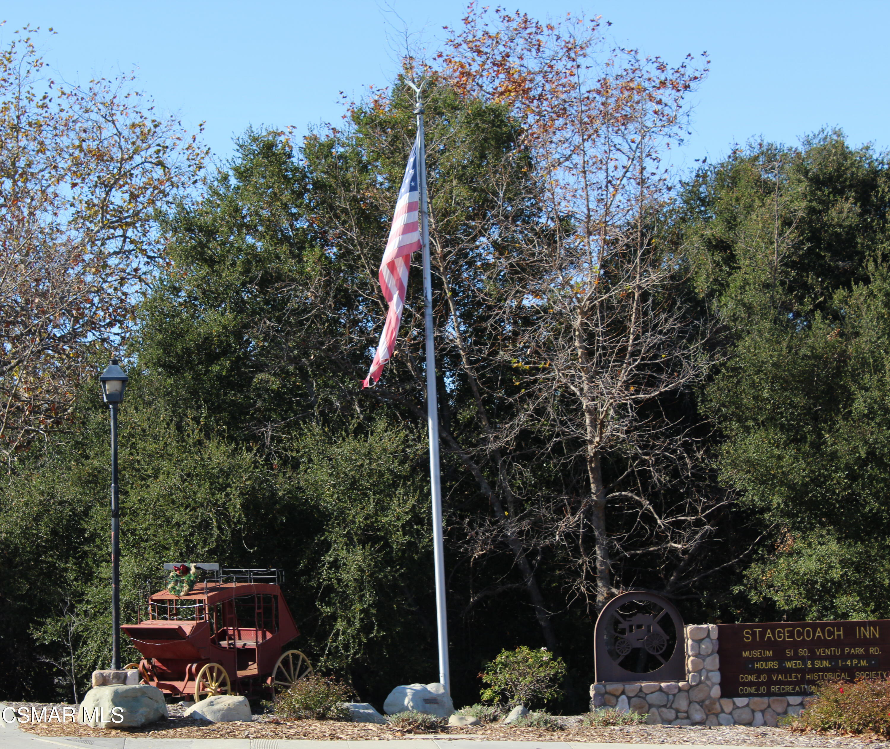 59 Farland Drive Thousand Oaks, CA 91320 - Photo 24 of 24 a backyard of a house with lots of green space and fountain