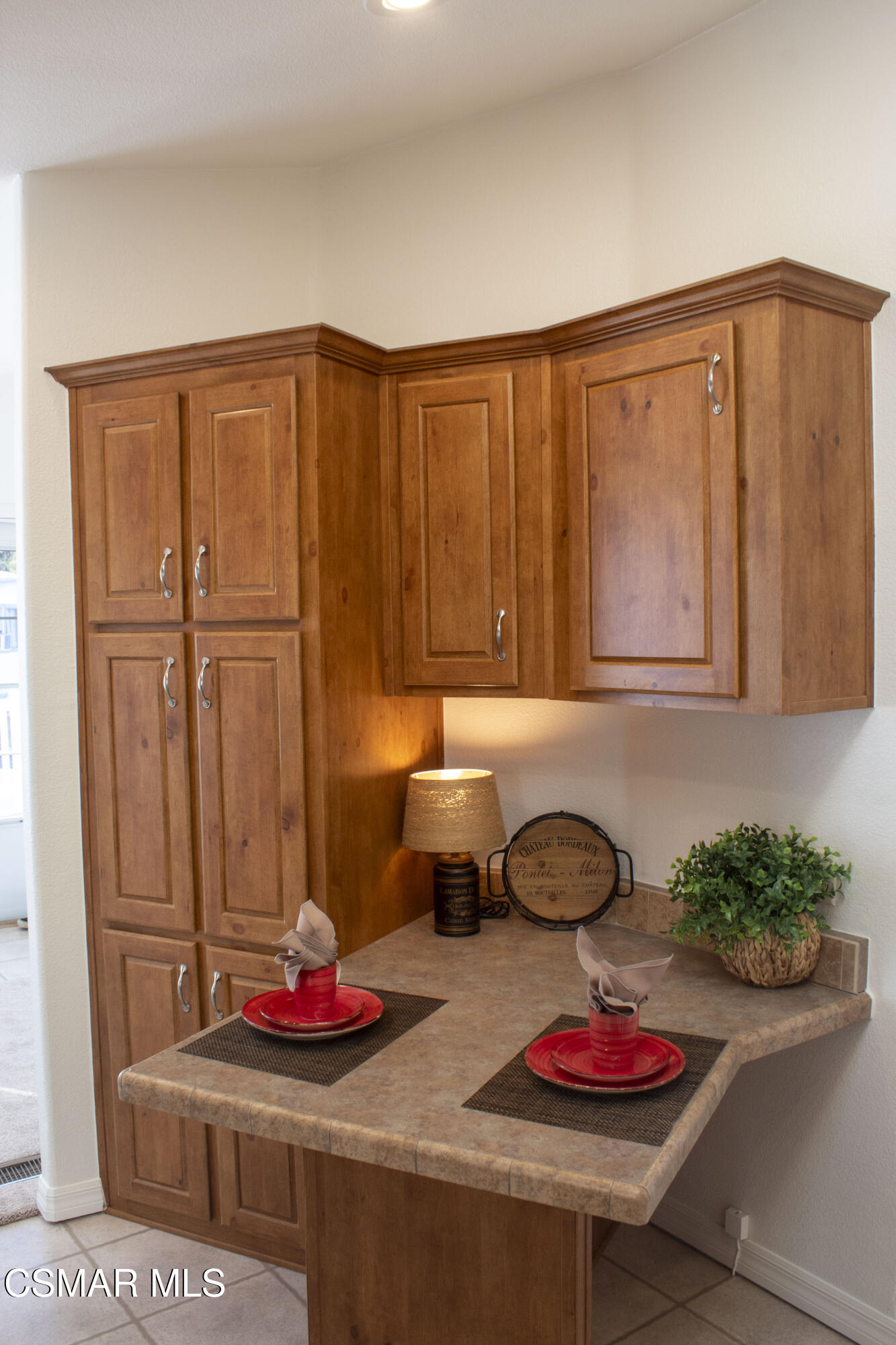59 Farland Drive Thousand Oaks, CA 91320 - Photo 3 of 24 a kitchen with a refrigerator and a stove