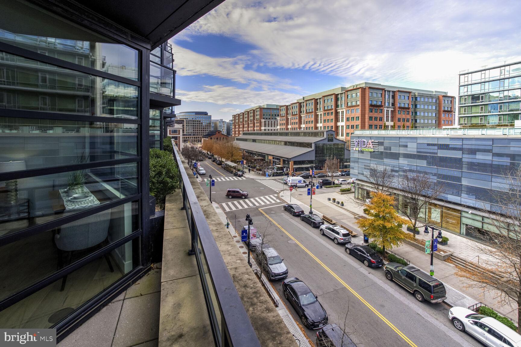 1300 4th Street Southeast, Unit 413 Washington, DC 20003 - Photo 15 of 29 a view of a balcony with chairs
