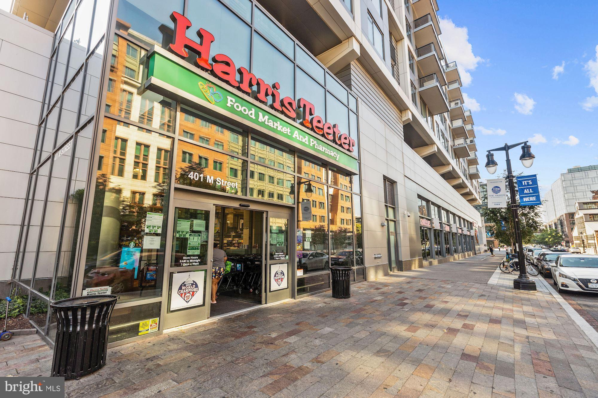 1300 4th Street Southeast, Unit 413 Washington, DC 20003 - Photo 24 of 29 a multi story building with glass windows