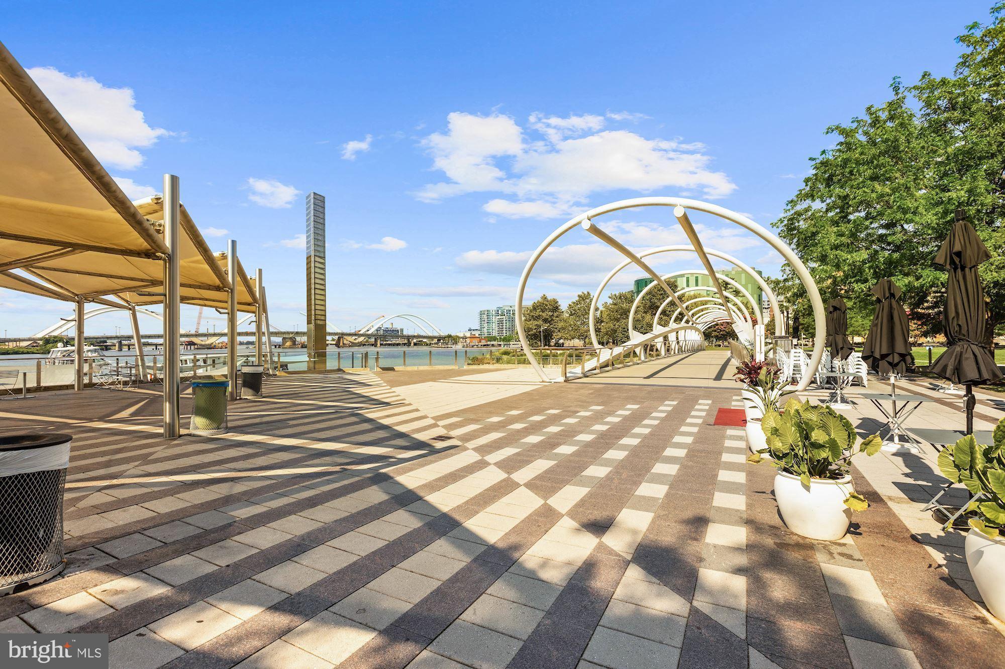 1300 4th Street Southeast, Unit 413 Washington, DC 20003 - Photo 29 of 29 a view of swimming pool with outdoor seating and yard