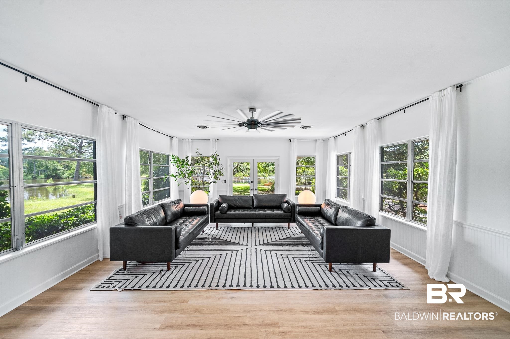 18513 Yacht Club Road Foley, AL 36535 - Photo 12 of 53 Sunroom / solarium with a healthy amount of sunlight and ceiling fan