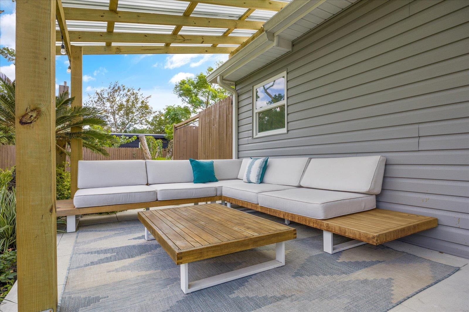 12 Dallyon Avenue St. Augustine, FL 32080 - Photo 41 of 60 a outdoor living space with furniture and a potted plant