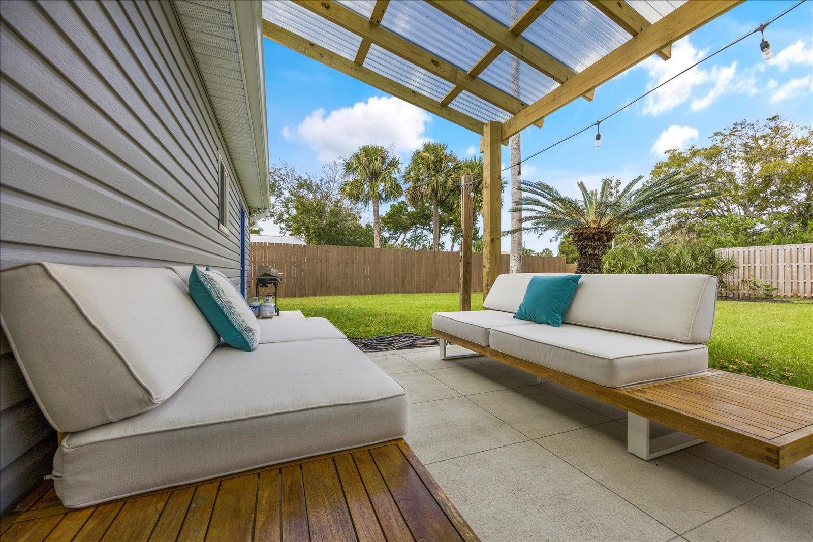 12 Dallyon Avenue St. Augustine, FL 32080 - Photo 42 of 60 a view of yard from outdoor seating