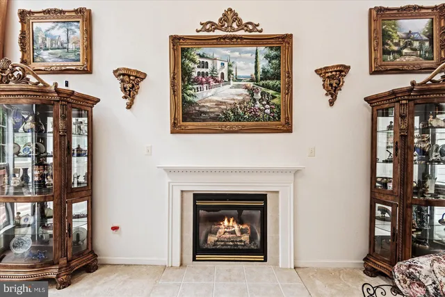a bathroom with a toilet a sink and a mirror