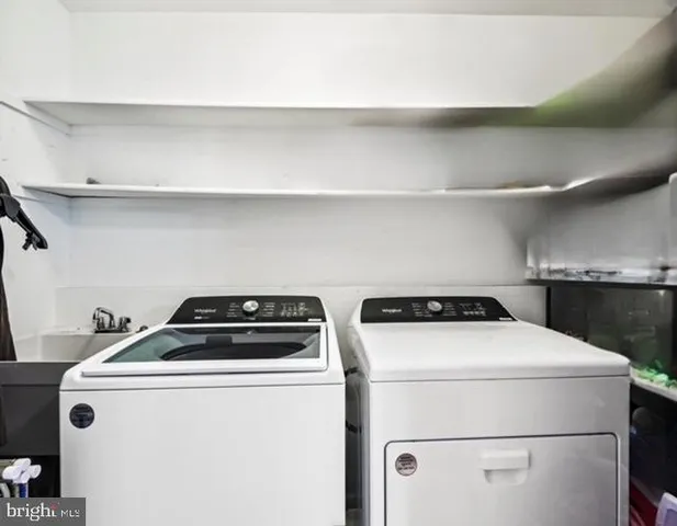 a view of a swimming pool with a yard